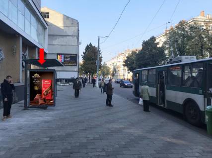 Ситилайт B в Житомире, 1.8x1.2  Київська вул., 22 / вул. Покровська (колиш. вул. Щорса), зупинка «Укртелеком», в центр фото 1