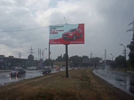 Видеоборд A у Києві Богатирська вул., 1А, розподілювач, автосалон Mitsubishi/Peugeot, від ст.м. Почайна (колишня Петрівка), прайс за трансляцію ролика 10 сек 1вихід/90 сек, з 0:00 до 23:59 - 366932 Фото 1