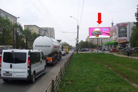 Билборд A в Тернополе, 3x6  15-го Квітня вул. / Бойчуків вул., біля ТЦ "Рай Центр", супермаркету "Сільпо", в центр фото 1