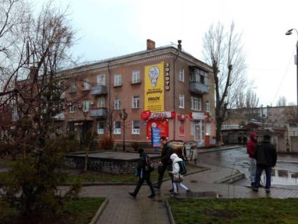 Билборд A в Бердянске Азовский пр. - Шмидта ул., 22/22, на фасаде фото 1