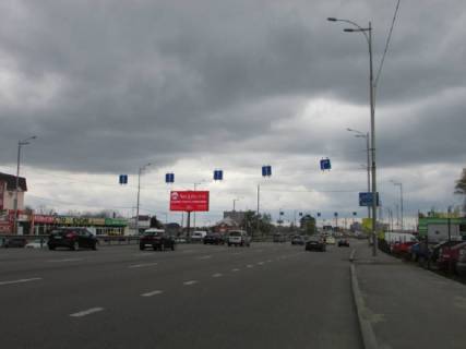 Білборд, Бігборд (Борд)  A у Києві Кільцева дорога - Зодчих вул., 36, навпроти, розподілювач, в сторону просп. Берестейський (Перемоги)., прайс за трансляцію ролика 10 сек 1вихід / 80 сек, з 0:00 до 23:59 Фото 1