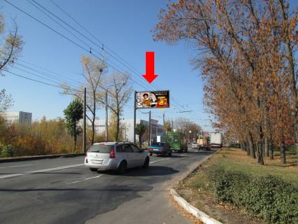 Билборд  в Харькове, 3x6  просп. Героїв Харкова (Московський), ст. м. "Індустріальна" (кол. ст. м. "Пролетарська"), біля ТЦ "Класс", супермаркетів "Comfy", "Восторг", в центр (флажок) фото 1