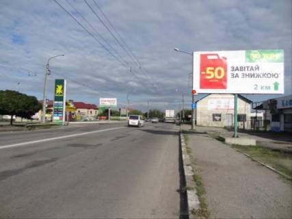 Билборд  в Ивано-Франковске, 3x6  Тисменицька вул. - Рінь (Укр. Декабристів) вул., навпроти АЗС "Окко", з центру фото 1