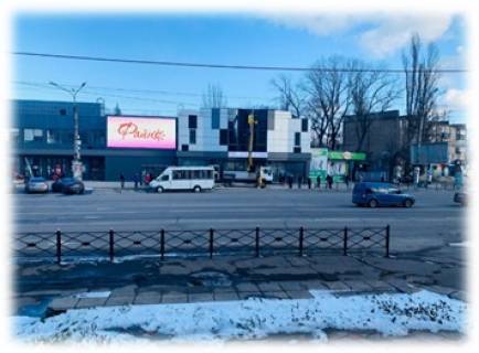 Видеоборд A у Кривому Розі Горького пл. - вул. Вільної Ічкерії (Волгоградська),., 1Д, майдан 95-й квартал (пл. Горького)., Прайс за ролик 10 сек, 1 вихід / 5хвилин c 7:00 до 22:00. Розрахунок інших параметрів уточнюйте у менеджера. - 292439 Фото 1