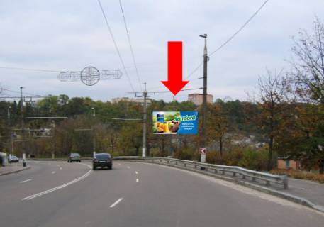 Билборд A в Житомире, 3x6  Чуднівська вул. (кол. Черняхівського вул.)  / Набережна вул., біля мосту, в центр фото 1