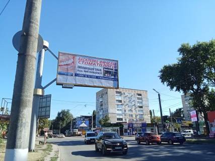 Білборд, Бігборд (Борд)  B у Кропивницький (Кіровоград), 3x6  Яновського вул. / Тамма вул. (кол. Героїв Сталінграду вул.), "Колгосний" і "Критий" ринки (флажок) Фото 1