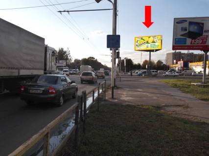 Billboard  in Zhytomyr, 3x6  Nezaleznosti av. (kol. Vatutina st.) / Otamaniv Sokolovs'kih st. (kol. Potapova st.), v bik Pokrovs'koi st. (kol. Sorsa st.), bila supermarketu "Ekomarket", na svitlofori Photo 1