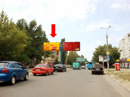 Билборд A в Херсоне, 3x6  Університетська вул. (кол. 40-річчя Жовтня вул.), 104, біля кінотеатру "Супутник", роздільник, в центр, ліва фото 1