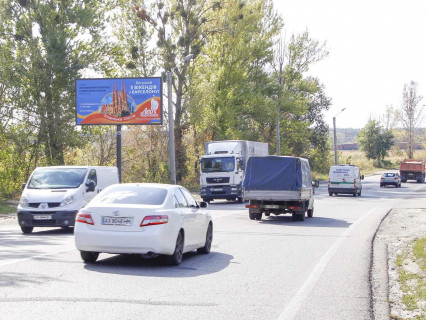 Білборд, Бігборд (Борд)  B у Харкові, 3x6  Мереф'янське шосе, навпроти буд. 36, з центру Фото 1