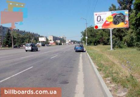 Билборд  в Днепр (Днепропетровск) Заводская Набережная ул., 4, напротив супермаркета "Сильпо", возле "McDonald's", из центра фото 1