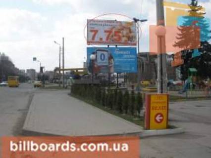 Билборд A в Ивано-Франковске Вовчинецька (Гагаріна) вул. - Надрічна вул., біля ТРЦ "Велес", на світлофорі, верхній, в центр фото 1