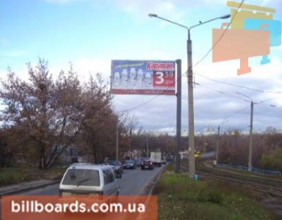 Білборд, Бігборд (Борд)  A у Харкові Тракторобудівників пр., 79/42, навпроти Фото 1