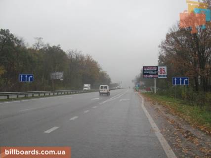 Білборд, Бігборд (Борд)  A у Києві Житомирська траса, в напрямку м.Київ, перед с.Мила, (150 м перед заправкою "ТНК"), 7км + 600метров Фото 1