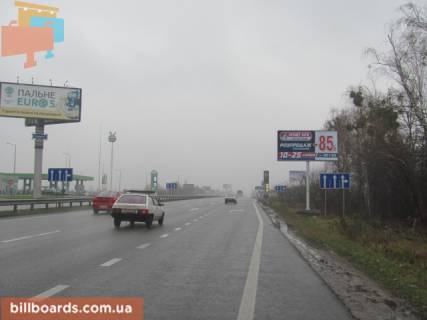 Билборд A в Киеве Житомирська траса, в напрямку м.Київ, перед с.Міла, (100 м перед заправкою "ТНК"), 7км + 200 метрів фото 1