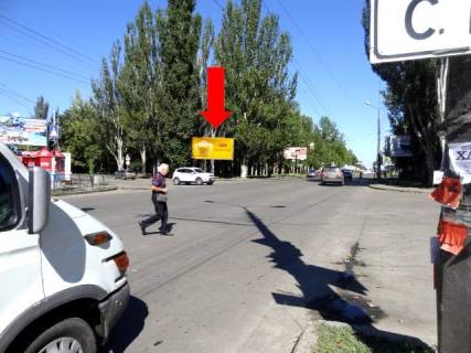 Билборд A в Николаеве, 3x6  Миру пр. / Театральна вул. (кол. Васляєва вул.), біля Приватбанку, супермаркету "Novus", в центр фото 1