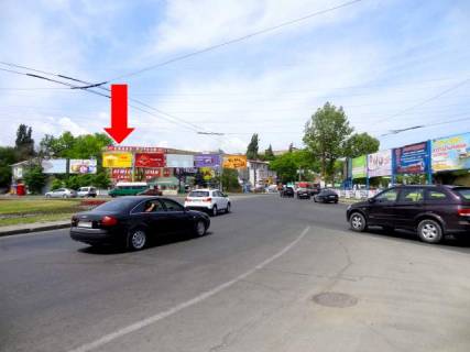 Билборд A в Николаеве, 3x6  Богоявленський пр. (кол. Жовтневий пр.) / Погранична вул. (кол. Чигрина вул.), кільце автовокзалу, біля супермаркетів "Велика Кишеня", "Технополіс", ліва фото 1