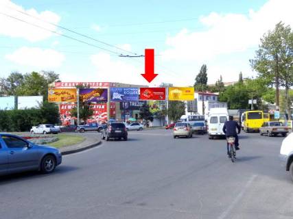 Билборд A в Николаеве, 3x6  Богоявленський пр. (кол. Жовтневий пр.) / Погранична вул. (кол. Чигрина вул.), кільце автовокзалу, біля супермаркетів "Велика Кишеня", "Технополіс", ліва фото 1