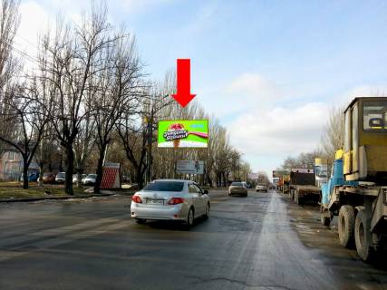 Билборд B в Николаеве, 3x6  Херсонське шосе / Чорновола вул. (кол. Гмирьова вул.), біля Миколаївського хлібзаводу №1, в центр (флажок) фото 1