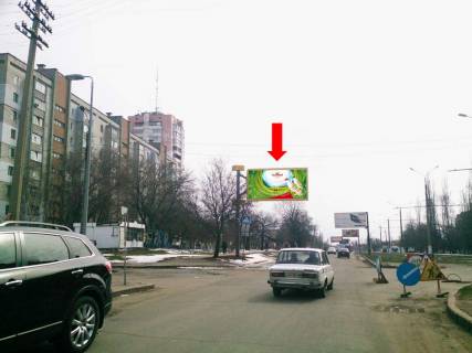 Билборд B в Николаеве, 3x6  6-та Слобідська вул. (кол. Комсомольська вул.), 46, біля БТ «Південний Буг», з центру (флажок) фото 1