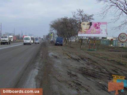 Білборд, Бігборд (Борд)  A у Одесі Новомиколаївська дорога, 1 км, ТРЦ "Суворовський", біля супермаркету "Таврія В", з центру Фото 1