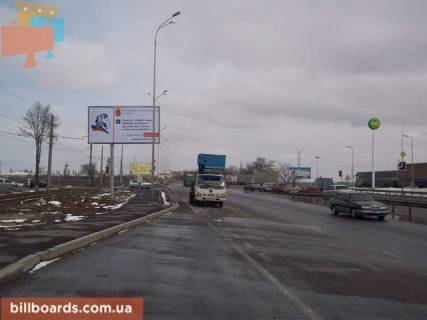 Билборд B в Одессе Новомиколаївська дорога, 1 км, ТРЦ "Суворовський", біля супермаркету "Таврія В", з центру фото 1