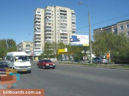 Білборд, Бігборд (Борд)  A у Рівному Небесної Сотні вул. (Колиш. Кіквідзе вул.), 16, навпроти Фото 1