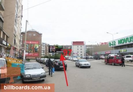 Білборд, Бігборд (Борд)  A у Тернополі Перля ул., возле супермаркетов "Novus", "Эльдорадо", "Jysk", в сторону Острожского ул. Фото 1