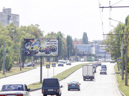 Білборд, Бігборд (Борд)  B у Харкові, 3x6  просп. Льва Ландау (50-річчя СРСР), 123, з центру Фото 1