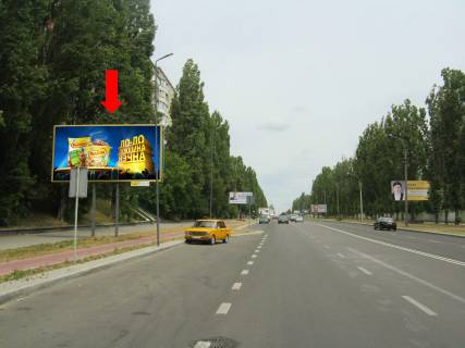 Билборд B в Ровно, 3x6  Шухевича вул., 18, біля АЗС "ОККО", 600 м. до супермаркету "Thrash", в бік супермаркету "Novus" фото 1