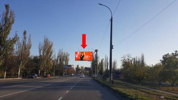 Билборд A в Херсоне, 3x6  Миколаївське шосе, біля автосалону "Лада", в центр (флажок) фото 1