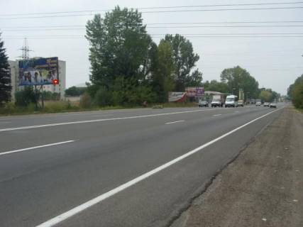 Билборд  в Ивано-Франковске, 3x6  Тисменицька вул., АЗС "ВОГ", в центр фото 1