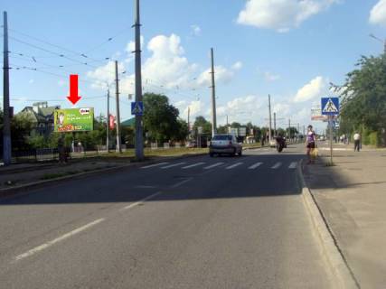 Билборд  в Львове, 3x6  Княгині Ольги вул., 51 / Бойчука вул., біля зупинки, в центр фото 1