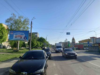 Білборд, Бігборд (Борд)  B у Івано-Франківську, 3x6  Вовчинецька (Гагаріна) вул., навпроти АЗС "ОККО", у бік ТЦ "Veles Mall" Фото 1