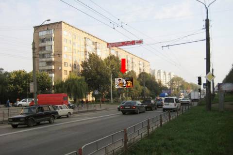 Білборд, Бігборд (Борд)   у Тернополі, 3x6  15-го Квітня вул. / Бойчуків вул., біля ТЦ "Рай Центр", супермаркету "Сільпо", з центру Фото 1