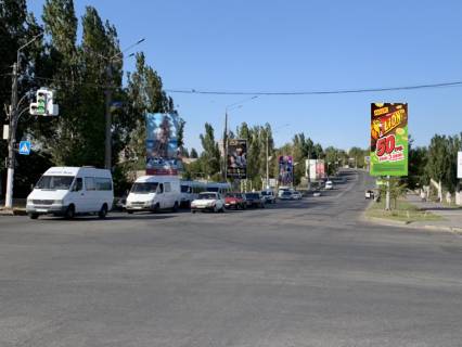 Білборд, Бігборд (Борд)   у Мелітополі, 6x3  50-річчя Перемоги. - вул. Сагайдачного (колиш. вул. Фрунзе), на світлофорі, з центру Фото 1