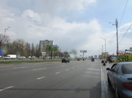 Білборд, Бігборд (Борд)  A у Києві Кільцева дорога - Зодчих вул., 36, навпроти, розподілювач, в сторону Жулянського шляхопроводу, прайс за трансляцію ролика 10 сек 1вихід / 80 сек, з 0:00 до 23:59 Фото 1
