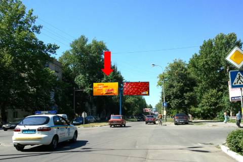 Білборд, Бігборд (Борд)   у Херсоні, 3x6  Університетська вул. (кол. 40-річчя Жовтня вул.), 120 / 28-ої Армії вул., роздільник, в центр, ліва Фото 1