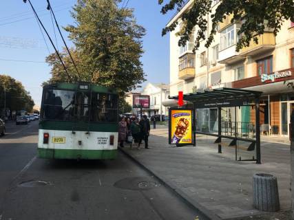 Ситилайт A в Житомире, 1.8x1.2  Київська вул., 17, зупинка кінотеатр «Україна», в центр фото 1