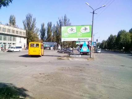 Білборд, Бігборд (Борд)  B у Кривому Розі Горняков ул., 38, мкр. Ингулец, (АвтоСтиль, пиццерия "Челентано"), выезд из Автовокзала Фото 1