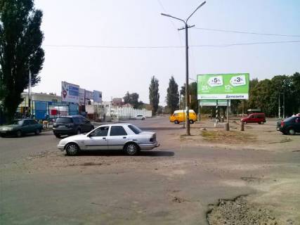 Білборд, Бігборд (Борд)  A у , , 6x3  Горняків вул., 38, мкр. Інгулець (автовокзал, ринок), за поворотом Фото 1