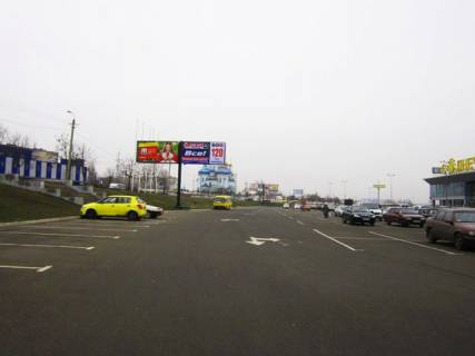 Билборд A в Кривом Роге, 6x3  30 років Перемоги пл., 1, стоянка Сонячна галерея, с\м "ОКЕЙ" ,правий фото 1