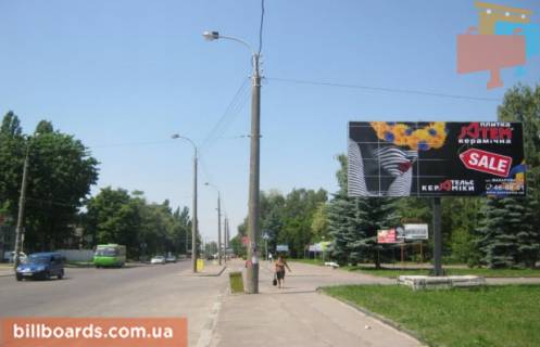 Білборд, Бігборд (Борд)  B у Рівному, 3х6  м. Рівне вул. Володимира Стельмаха (Курчатова) 3, неподалік автозаправки “Авіос”, в’їзд на стадіон “Мототрек” Фото 1