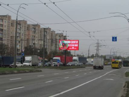 Видеоборд A в Киеве, 6x3  просп. Романа Шухевича (Генерала Ватутіна) (розподілювач), ТЦ "Райдужний", рух від Північного мосту - 297809 схема