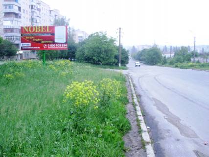 Билборд B в Каменец-Подольском, 3х6  Нігинське шосе 34 (західна сторона) навпроти будинку №49 фото 1