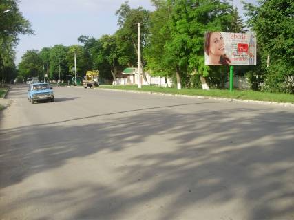Billboard A in Kam'yanets-Podilsky, 3х6  Nigins'ke sose (zahidna storona) za 100 metriv do perehresta z st.Pivnicnou Photo 1
