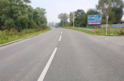 Білборд A у Жидачів, 6x3м.  м. Жидачів, вул. Данила Галицького, автошлях М12 (Стрий - Тернопіль), центральний виїзд з м.Жидачів в сторону м. Тернопіль, обмеження швидкості, автомийка Lux Wash, СТО Фото 1