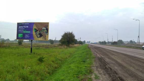 Билборд B в Буськ, 6x3м.  поряд АЗК ОККО, центральний вїзд в м. Буськ з сторони Львова, на м.Броди, траса Львів - Київ (Е-40) + жовта вітрозахисна люмінесцентна рамка фото 2
