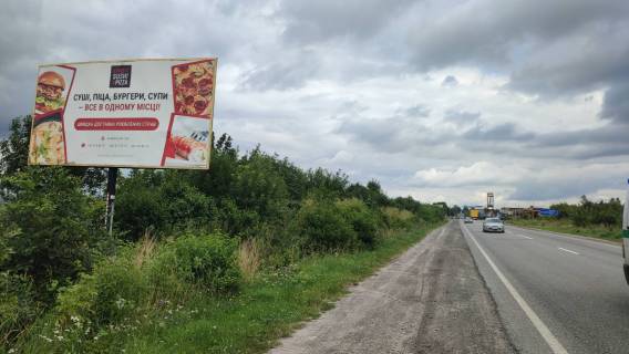 Билборд B в Золочеве (Львовской обл), 6x3м.  м. Золочів, центральний вїзд з сторони м. Львів + обїздна дорога на м.Тернопіль, траса Львів - Тернопіль (Н-02) + АЗК CNG і ANP + жовта вітрозахисна люмінесцентна рамка фото 3