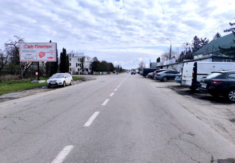 Билборд B в Буськ, 6x3м.  м. Буськ, вул. Львівська, 73, на центр, пішохідний перехід, поряд районна лікарня, зупинка гром. транспорту, великий базар  фото 1