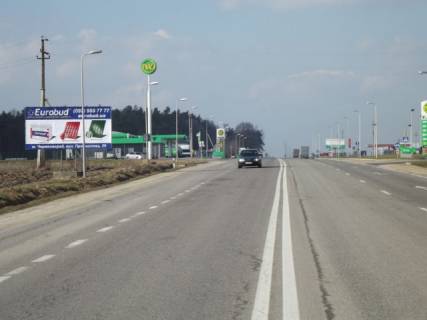 Билборд B на трассах Львовской области, 6x3м.  Кордон, на кордон з респ. Польща, автодорога Львів - Рава - Руська (М-09) + АЗК WOG, черга вантажівок не закриває видимість щита !!! фото 1